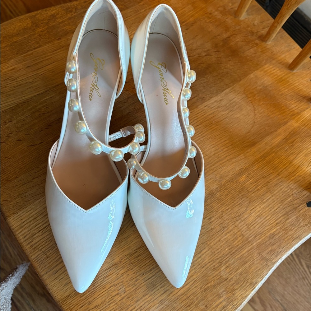 White, low heel, wedding shoe. Size 7